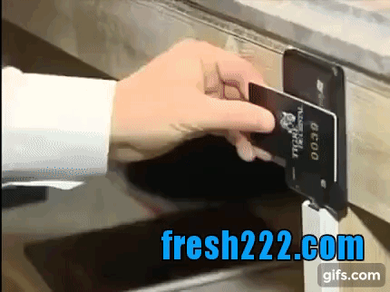 Demonstration of a card being used to call a numbered coat check conveyor position